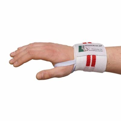 Hand mit elastischer Bandage in Weiß und Rot zur Gelenkstabilisierung.